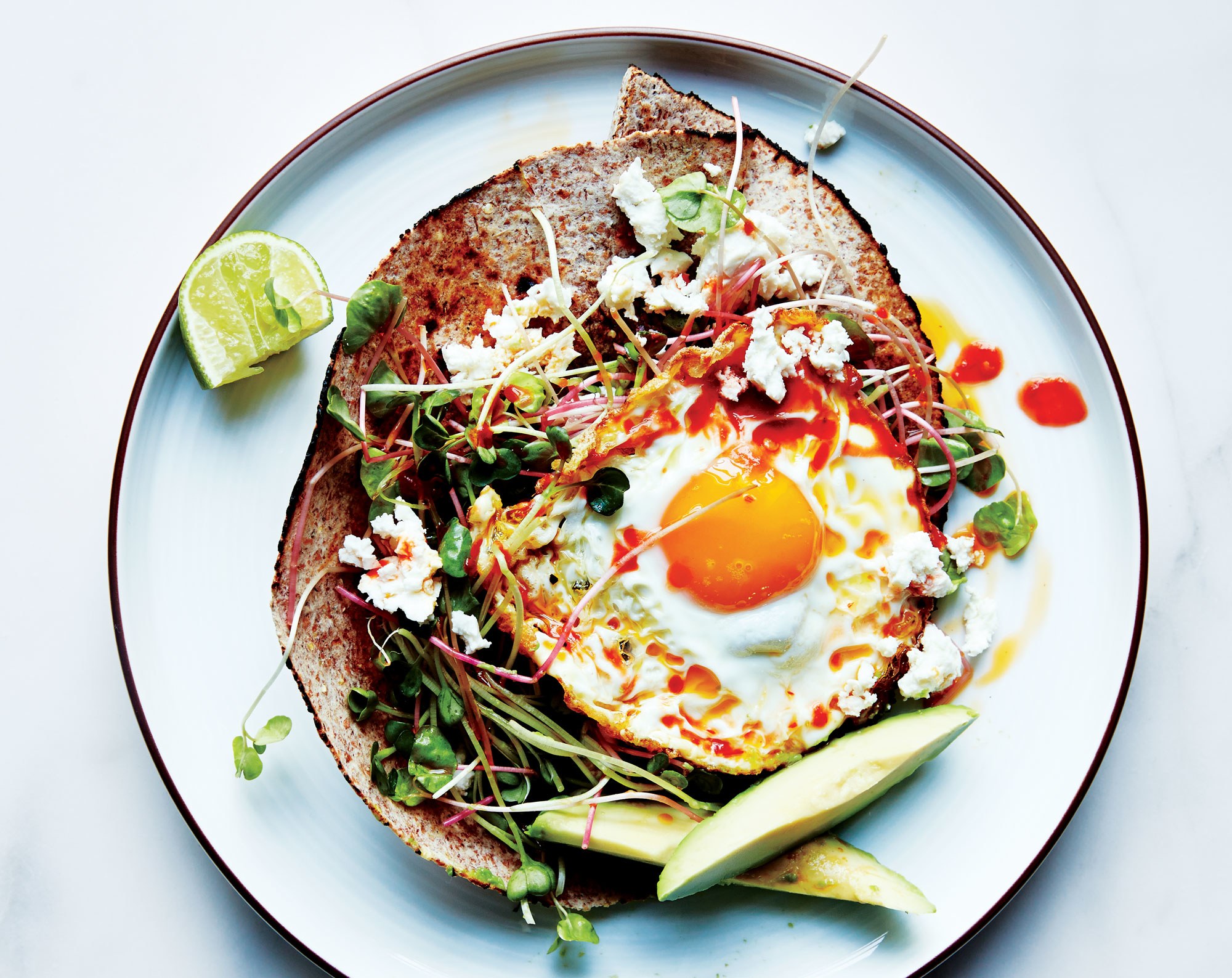 chile-and-olive-oil-fried-egg-with-avocado-and-sprouts-nikki-kuban-minton